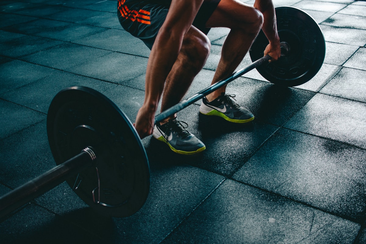 Athlete training in a sunlit gym